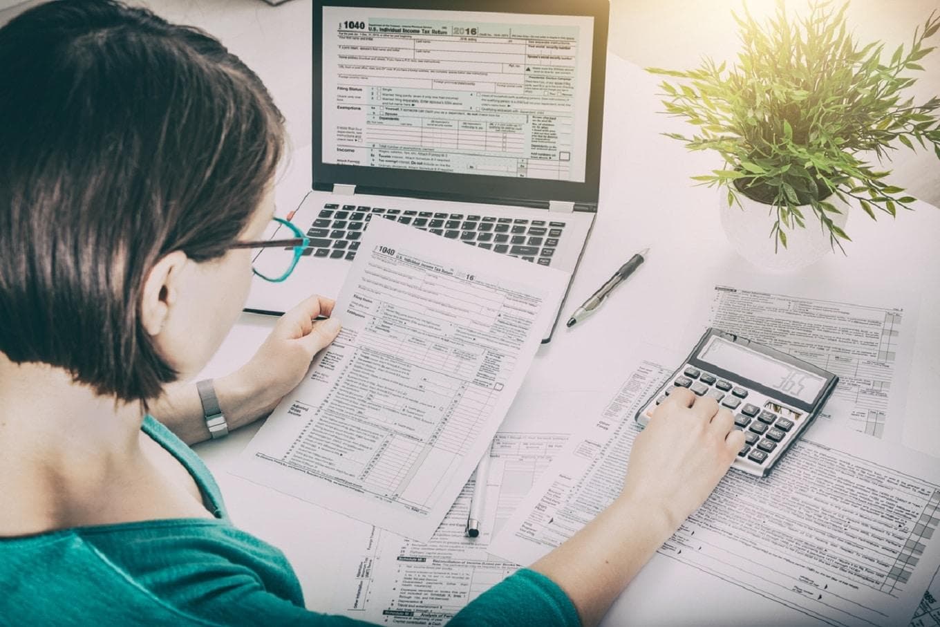 Tax and financial documents being reviewed